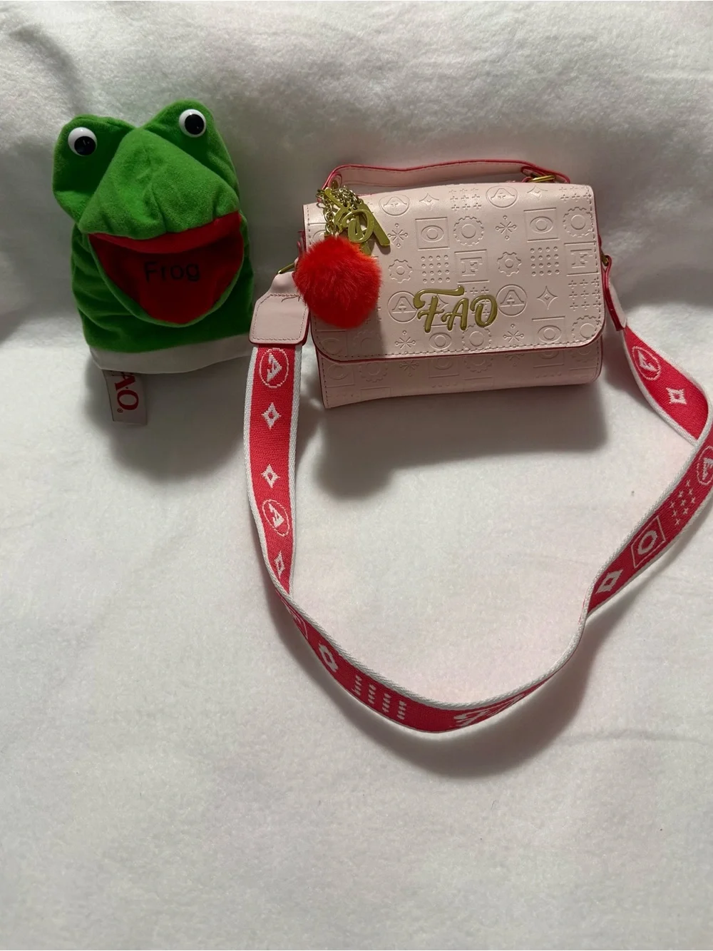 FAO Schwarz Blush Pink Embossed Crossbody Bag Red Strap Frog Hand Puppet